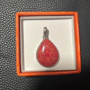 Red design charm